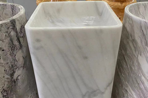 White pedestal basin hand washing stone marble