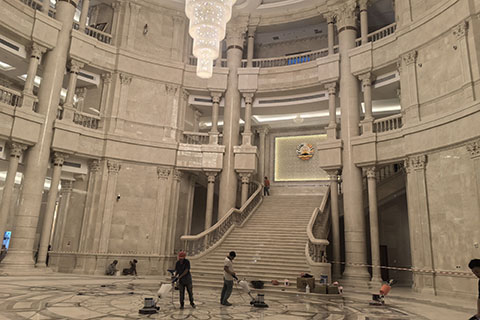 High-end marble interior hall under final cleaning for public building construction project.jpg