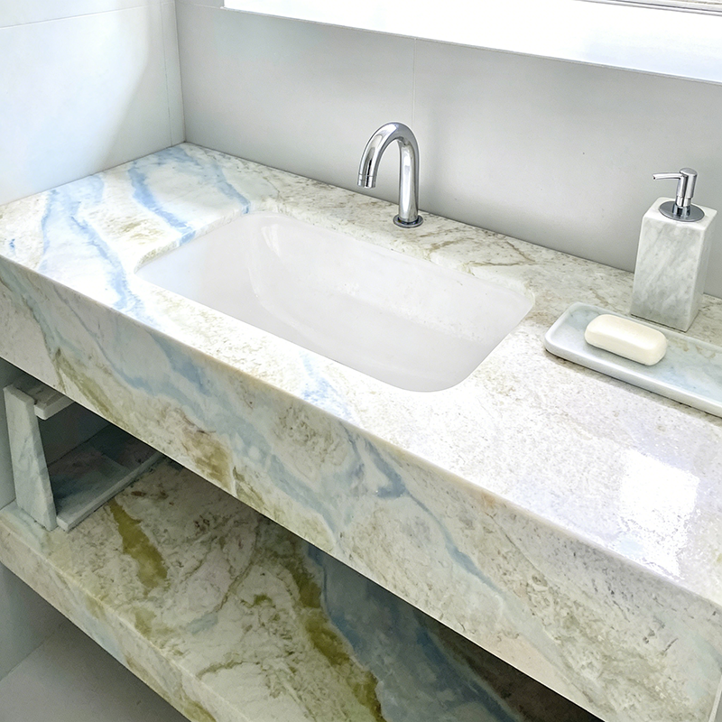Blue veined marble vanity top with integrated sink and floating shelf – stylish bathroom vanity countertop.png