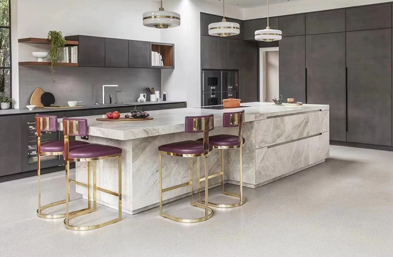 Modern kitchen island with waterfall edge quartzite slab..jpg